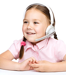 Image showing Young girl is working as an operator at helpline