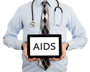 Image showing Doctor holding tablet - Aids