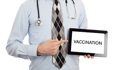 Image showing Doctor holding tablet - Vaccination