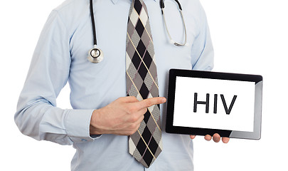 Image showing Doctor holding tablet - HIV