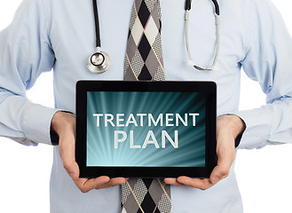 Image showing Doctor holding tablet - Treatment plan