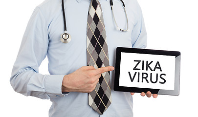 Image showing Doctor holding tablet - Zika virus