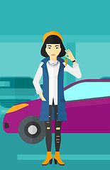 Image showing Woman holding keys from new car.