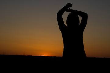 Image showing Girl at sunset