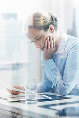 Image showing businesswoman having problem in office