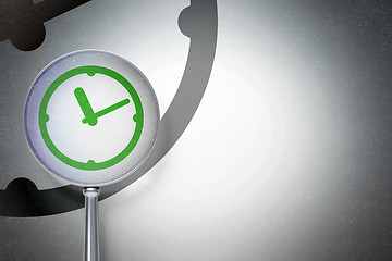 Image showing Time concept:  Clock with optical glass on digital background