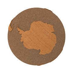 Image showing Antarctica on wooden planet Earth