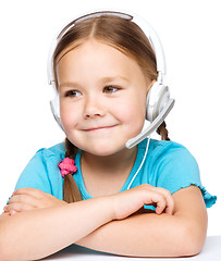 Image showing Young girl is working as an operator at helpline