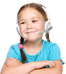 Image showing Young girl is working as an operator at helpline
