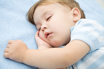 Image showing Cute little boy is sleeping