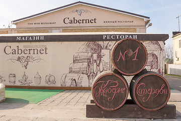 Image showing Sennoy, Russia - March 15, 2016: Three wine barrels in front of a wine restaurant 