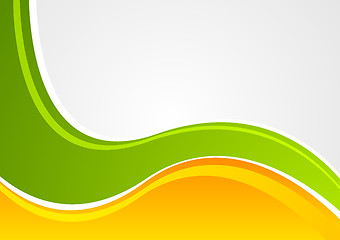 Image showing Bright green and orange wavy corporate background