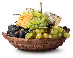 Image showing Cheese and grape in basket