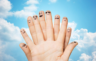 Image showing close up of hands and fingers with smiley faces