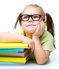 Image showing Little girl with books