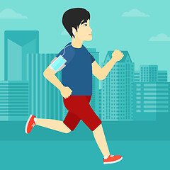 Image showing Man jogging with earphones and smartphone.