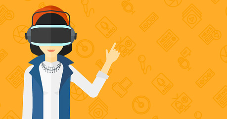 Image showing Woman wearing virtual reality headset.