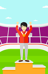 Image showing Athlete with medal and hands raised.