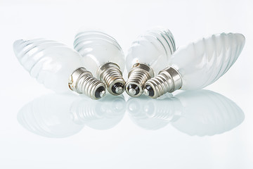 Image showing Light bulb isolated on white,  Realistic photo image