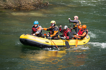 Image showing Yellow raft team