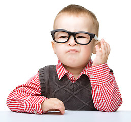 Image showing Portrait of a cute little boy wearing glasses