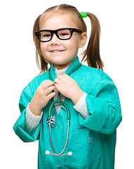 Image showing Cute little girl is playing doctor