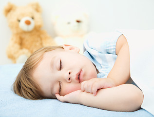 Image showing Cute little boy is sleeping