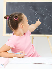 Image showing Little girl is studying