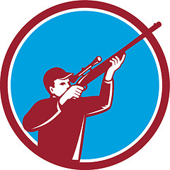 Image showing Hunter Shooting Up Rifle Circle Retro