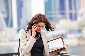Image showing business woman talking on the mobile