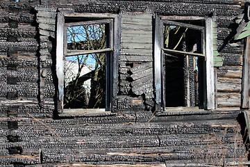 Image showing  empty window burnt house