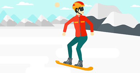 Image showing Young woman snowboarding.