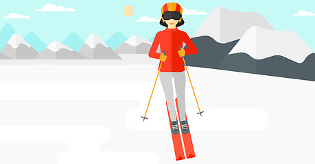 Image showing Young woman skiing.