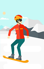 Image showing Young woman snowboarding.