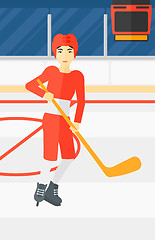 Image showing Ice-hockey player with stick.