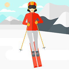 Image showing Young woman skiing.