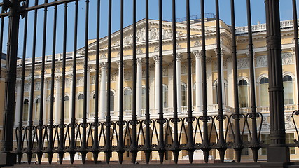 Image showing  high iron fence in front of palace