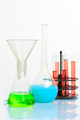 Image showing Test-tubes with liquid on light background