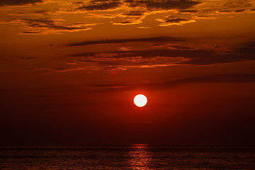 Image showing red sunset over water