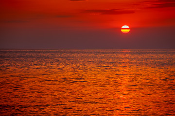 Image showing red sunset over water