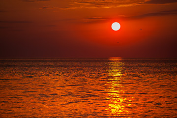 Image showing red sunset over water