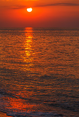 Image showing red sunset over water