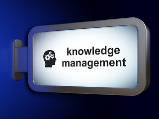 Image showing Studying concept: Knowledge Management and Head With Gears on billboard background