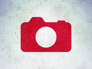 Image showing Vacation concept: Photo Camera on Digital Data Paper background