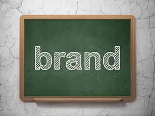 Image showing Marketing concept: Brand on chalkboard background