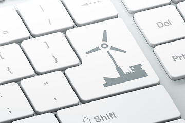 Image showing Manufacuring concept: Windmill on computer keyboard background