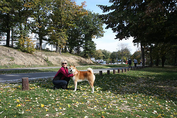 Image showing Lady and her dog