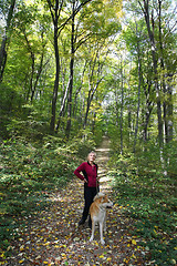 Image showing Lady and her dog