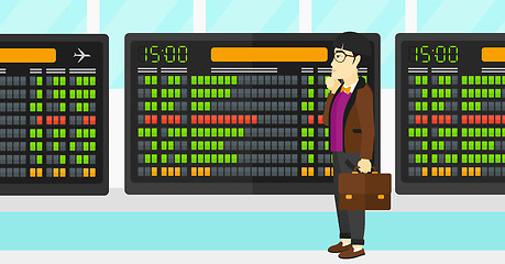 Image showing Man looking at schedule board.