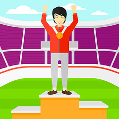 Image showing Athlete with medal and hands raised.